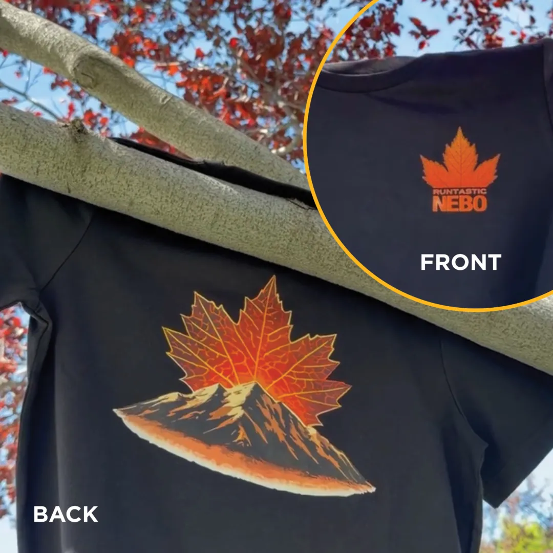 Runtastic NEBO 2026 Race Shirt hanging from a tree with red leaves and a blue sky in Payson, Utah